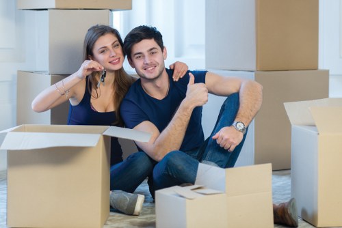 Moving boxes and furniture being handled during Marblearch removals in central London