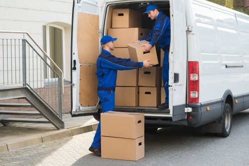 Loading furniture into a moving van near Marblearch streets