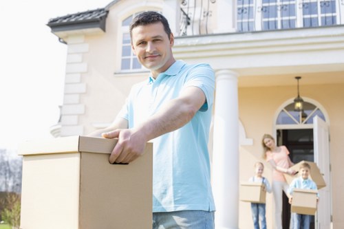 House movers handling stairs and access in a Marblearch apartment building