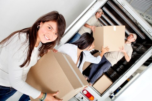 Office furniture being loaded for relocation near Marblearch